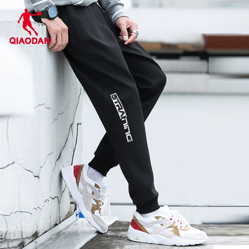 QIAODAN 喬丹 中國喬丹運(yùn)動褲秋款休閑男衛(wèi)褲青少年束腳寬松潮流時尚褲子